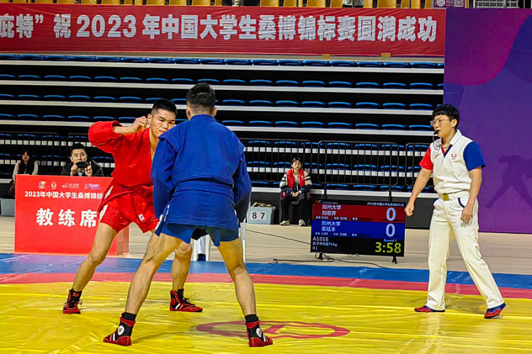 Action during Chinese SAMBO Championship among students © FIAS