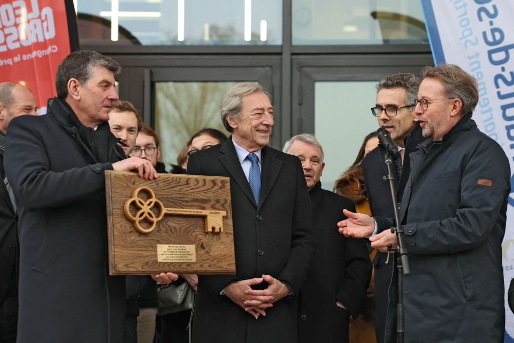 Georges Siffresi (C), president of the Haut-de-Seine district Council receives from Lionel Christolomme (R), chairman of the Leon Grosse board, the keys of the renovated and modernised Yves-du-Manoir stadium.  Getty Images
