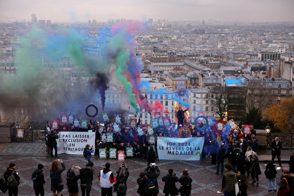 The protesters display their placards in Montmartre. GETTY IMAGES