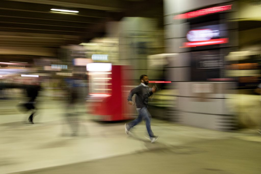 People run to catch at Gare Montparnasse railway station in Paris. GETTY IMAGES