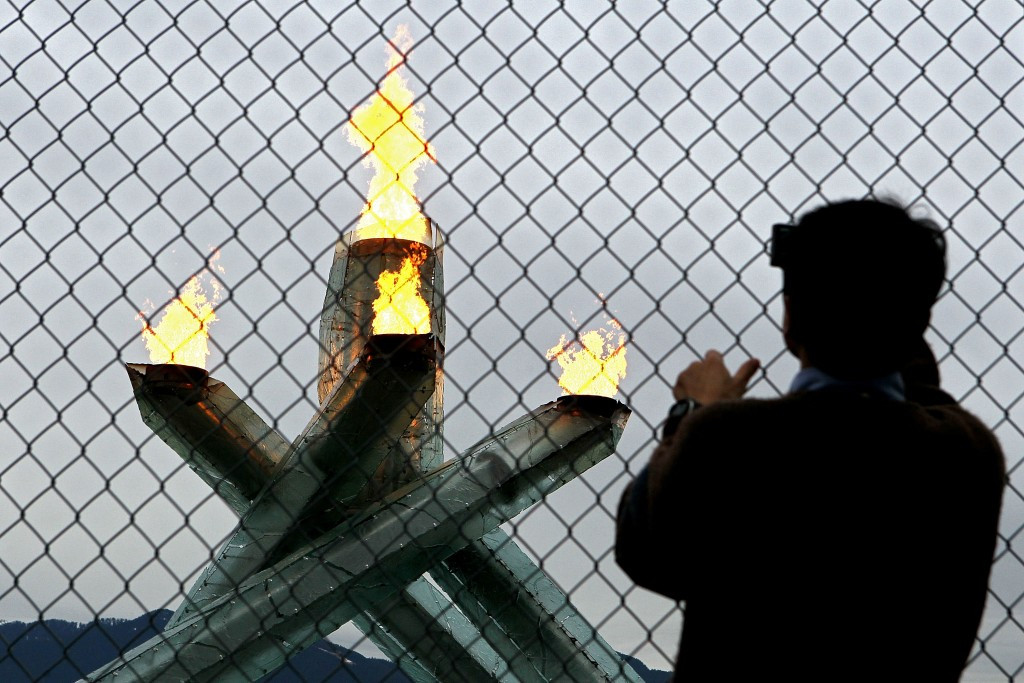 There was criticism that Vancouver 2010 kept the Olympic flame behind a wire fence ©Getty Images