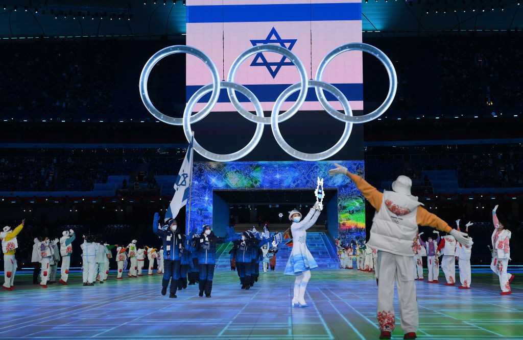 Flag bearers Evgeni Krasnopolski and Noa Szollos of Team Israel lead their team out during the Opening Ceremony of the Beijing 2022 Winter Olympics at the Beijing National Stadium on February 04, 2022 in Beijing.  GETTY IMAGES
