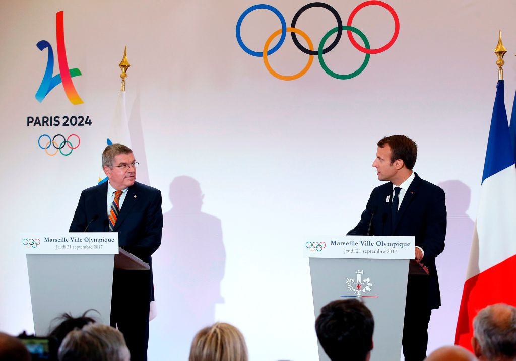 French President Emmanuel Macron and International Olympic Committee (IOC) President Thomas Bach hold a press conference. GETTY IMAGES