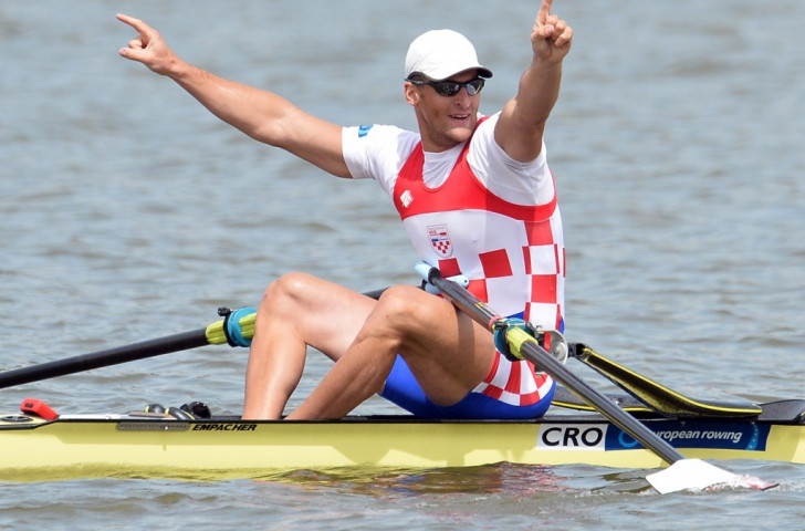 Damir Martin of Croatia held off world champion Ondrej Synek in the men's single sculls to win in a European Best Time ©Getty Images