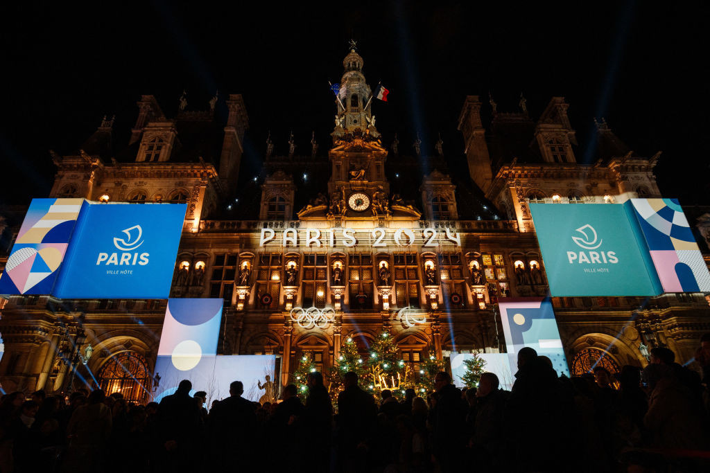 The illuminated facade of the Paris City Hall.  GETTY IMAGES