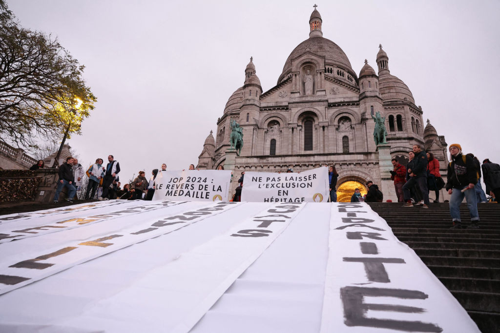 Banners on the Sacre Coeur Basilica in Paris. GETTY IMAGES