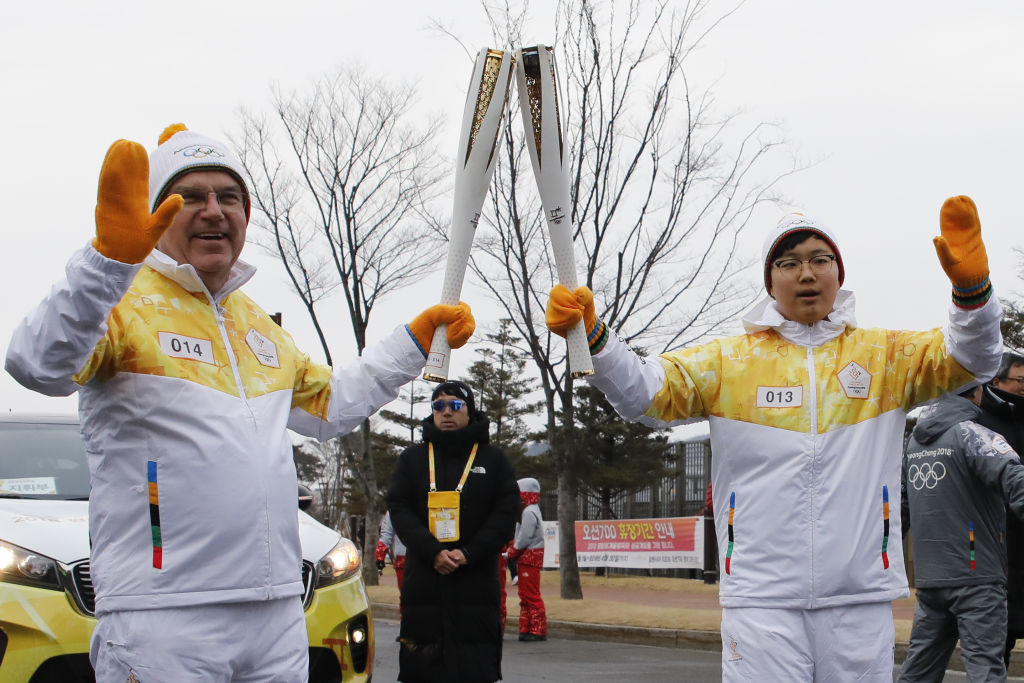 IOC President Thomas Bach at the Pyeongchang 2018 Torch Relay. GETTY IMAGES 