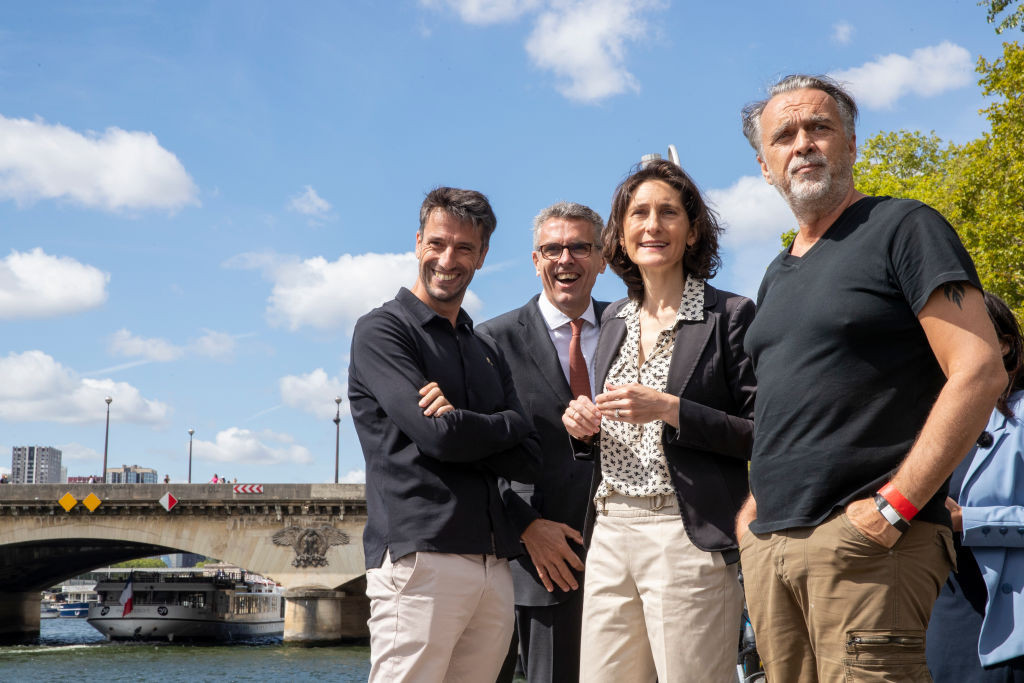 Tony Estanguet, accompanied by Marc Guillaume, Amélie Oudéa-Castéra and Thierry Reboul. GETTY IMAGES