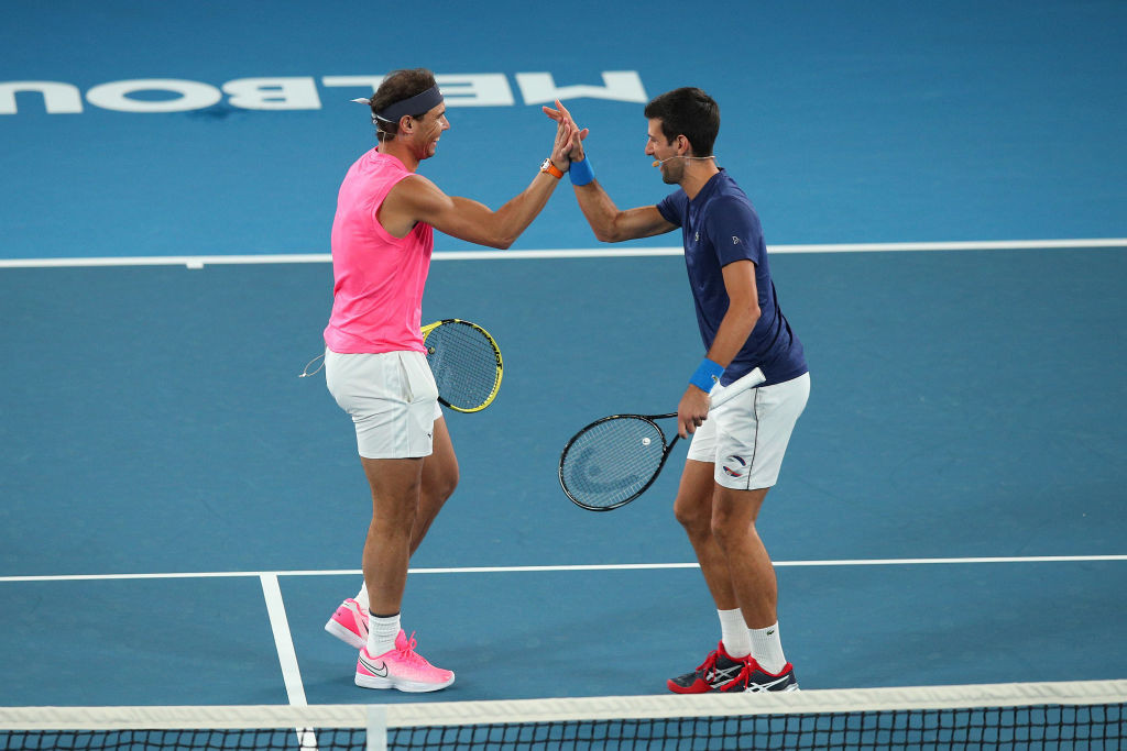 Spain's Rafael Nadal embraces Serbia's Novak Djokovic in Melbourne. GETTY IMAGES