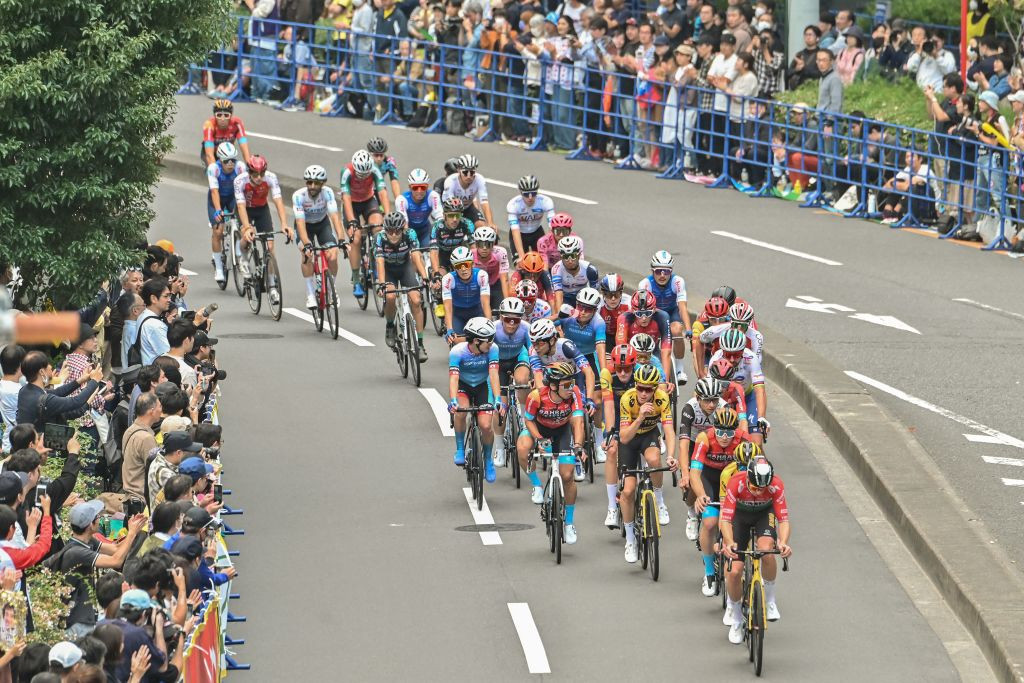 Tour de France peloton passes by spectators. GETTY IMAGES