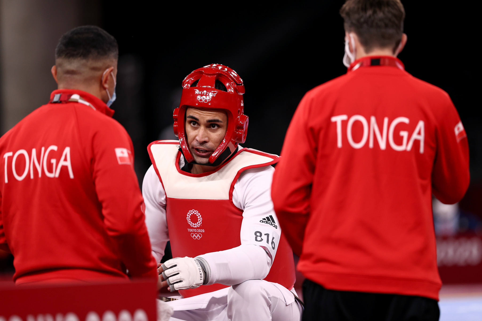 Pita Taufatofua (center) during the Men's +80kg Taekwondo Repechage contest on day four of the Tokyo 2020 Olympic Games Maja Hitij/Getty Images