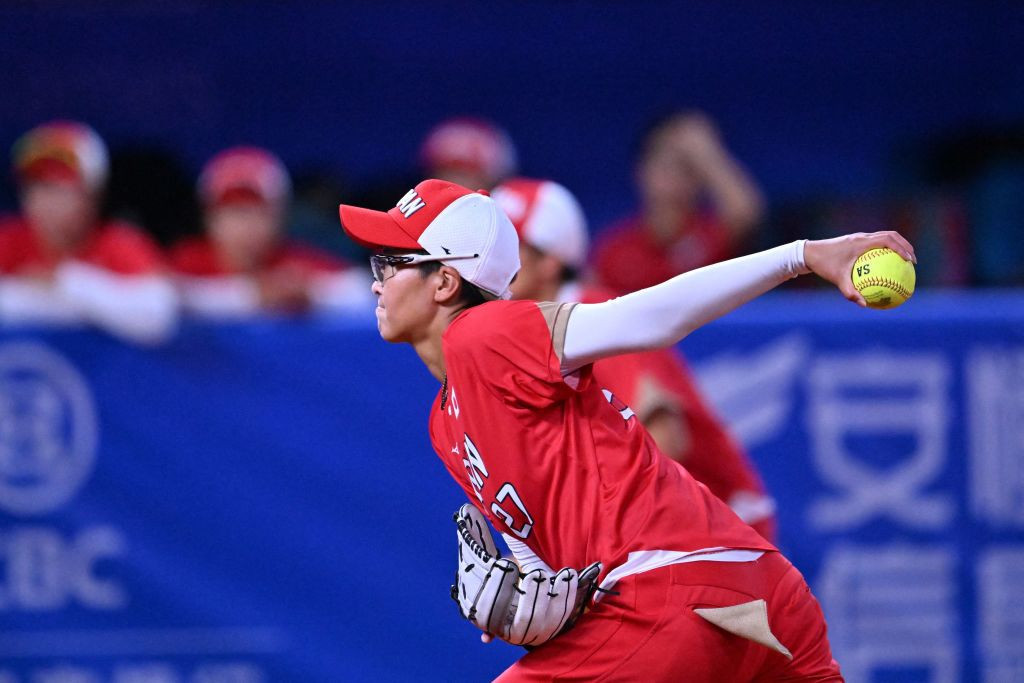 Japan's Miu Goto, in the softball women's final between Japan and China at the 2022 Asian Games. GETTY IMAGES