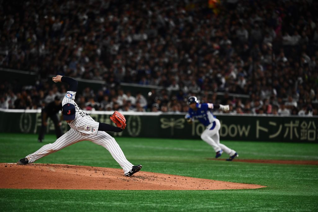 Rei Takahashi of Japan pitches during the WBSC Premier 12 Super Round Final baseball game between South Korea and Japan,. GETTY IMAGES