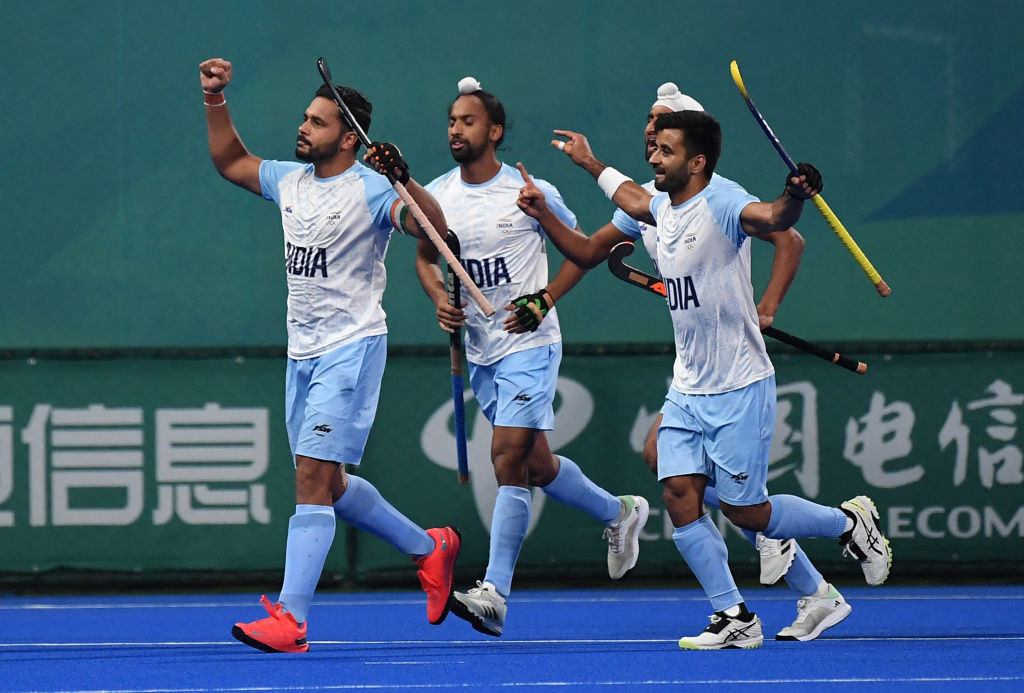 India's players celebrate their win at the men's final hockey match between India and Japan during the 2022 Asian Games in China. GETTY IMAGES