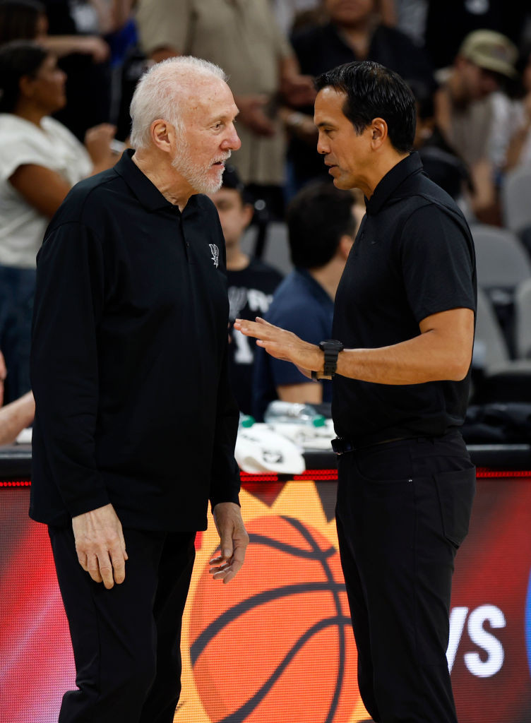 Gregg Popovich and Erik Spoelstra during an NBA game between the Spurs and Heat. GETTY IMAGES