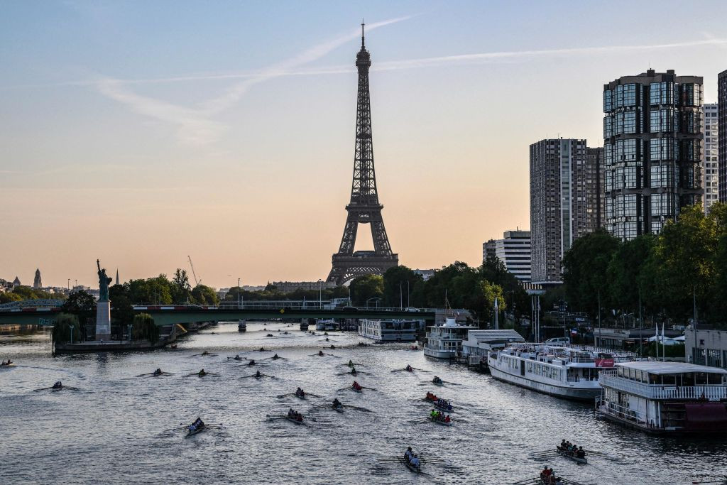 Rowers sculling on the Seine during the annual 'Traversee de Paris en Aviron'. GETTY IMA