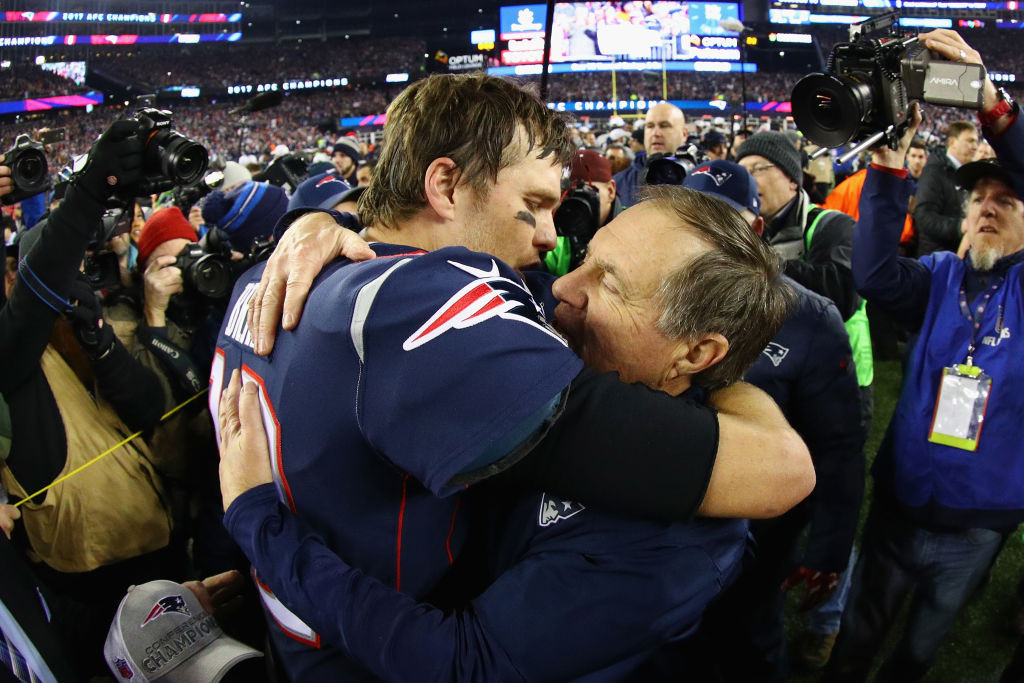 New England Patriots icon Tom Brady celebrates with coach Bill Belichick. GETTY IMAGES
