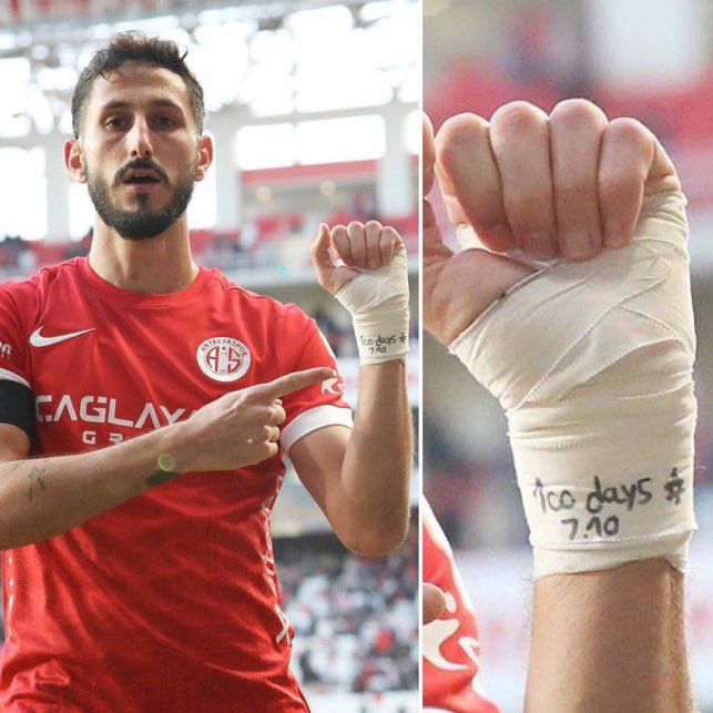 Sagiv Jehezkel shows off the bandage he wears on his left wrist while playing in the Turkish league.