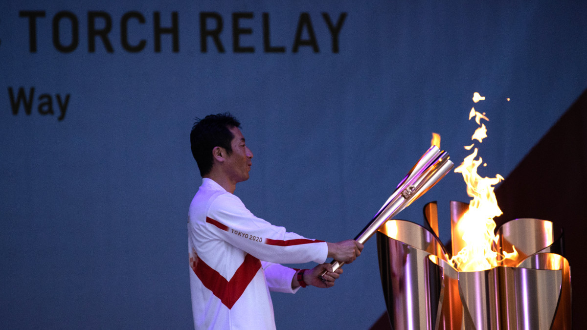 Last torchbearer of Day 1, Yoshihide Muroya, at the Tokyo 2020 Olympic Games. GETTY IMAGES