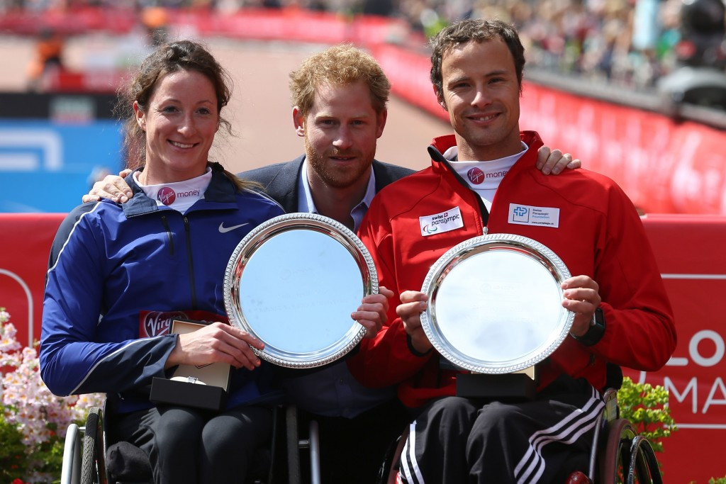 Marcel Hug (right) and Tatyana McFadden (left) pose with Prince Harry after their respective victories ©Twitter