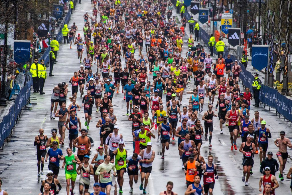 Thousands of runners make their way to the finish line during the Boston Marathon on 17 April 2023. GETTY IMAGES
