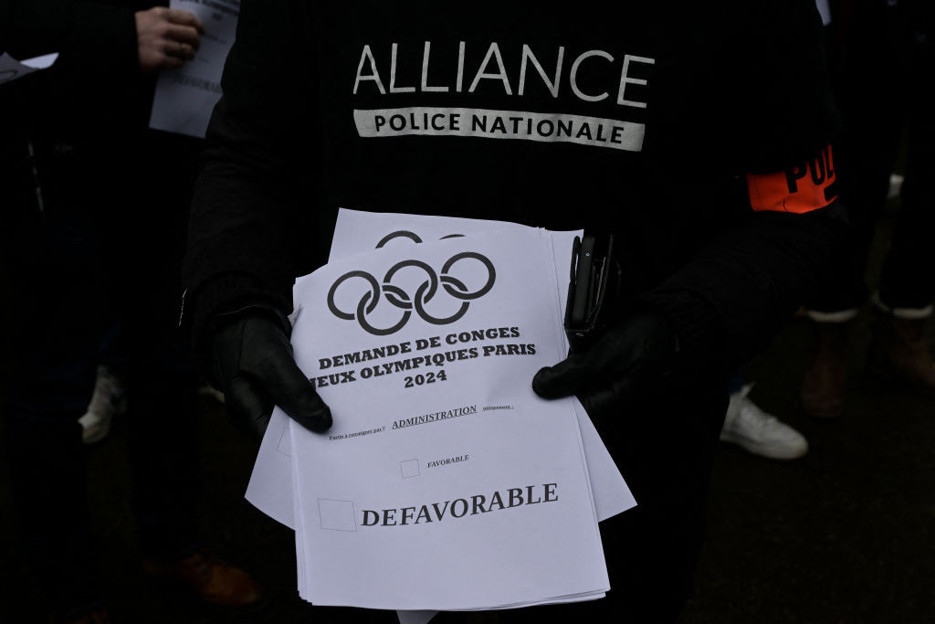 Police officers vote on leaflets, in Rennes to obtain "exceptional measures" in compensation for their compulsory presence at the 2024 Paris Olympic. GETTY IMAGES