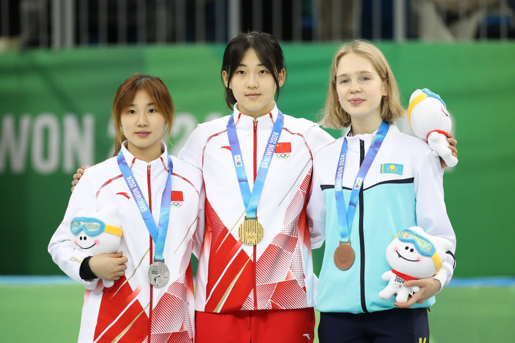 China's Yang Jingru (silver) and Li Jinzi (gold) with Kazakhstan's Polina Omelchuk third in 1000m. GETTY IMAGES