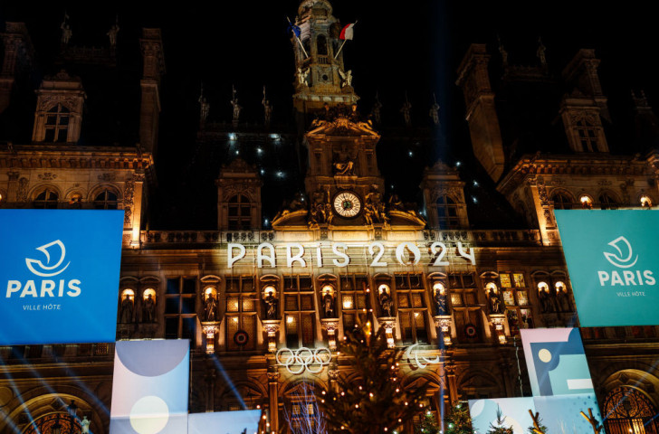 A banner and lettering with the city's logo on the illuminated facade of the Paris City Hall. GETTY IMAGES GETTY IMAGES