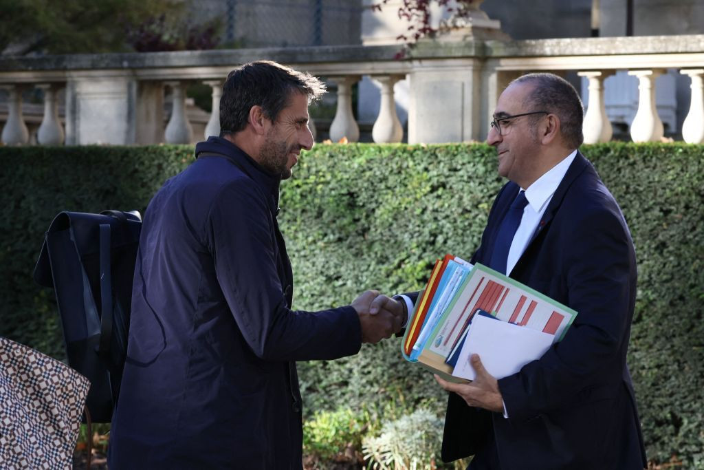 Paris Prefect of police Laurent Nunez greets President of the Paris 2024 Organising Committee for the Olympic and Paralympic Games, Tony Estanguet. GETTY IMAGES