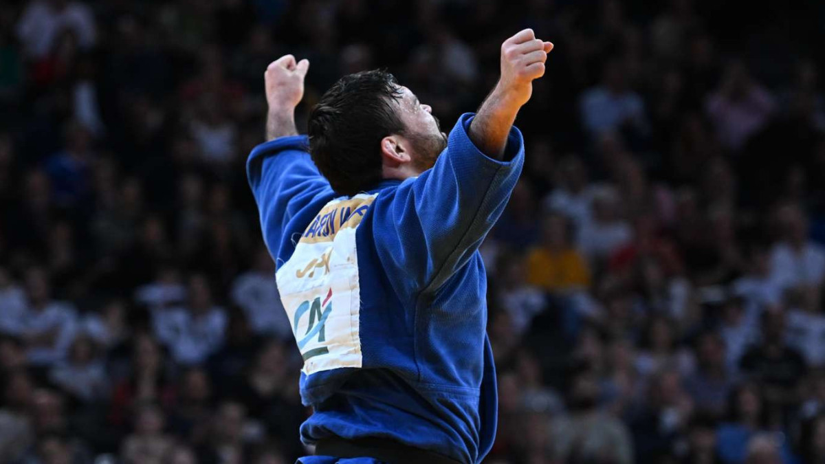 Japan's Aaron Wolf celebrates his victory at the 2024 Paris Grand Slam. IJF