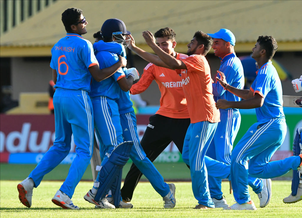The Indian players celebrate their passage to Sunday's final. GETTY IMAGES