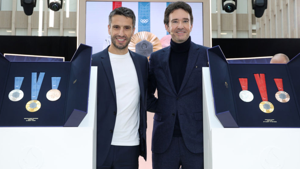Tony Estanguet and Antoine Arnault at the unveiling of the Paris 2024 Olympic and Paralympic medals. GETTY IMAGES