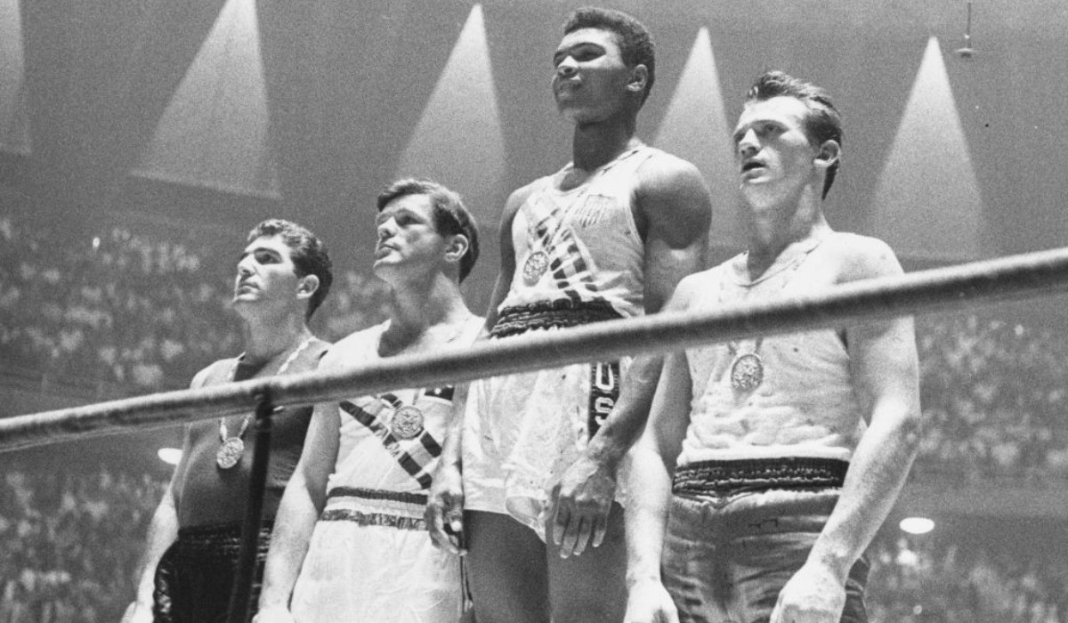 Cassius Clay with the gold medal at the 1960 Olympic Games in Rome. GETTY IMAGES