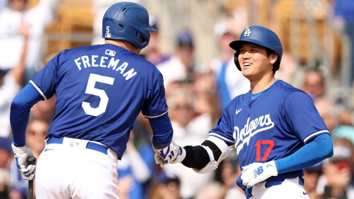 Shohei Ohtani greets his teammate Freddie Freeman. GETTY IMAGES