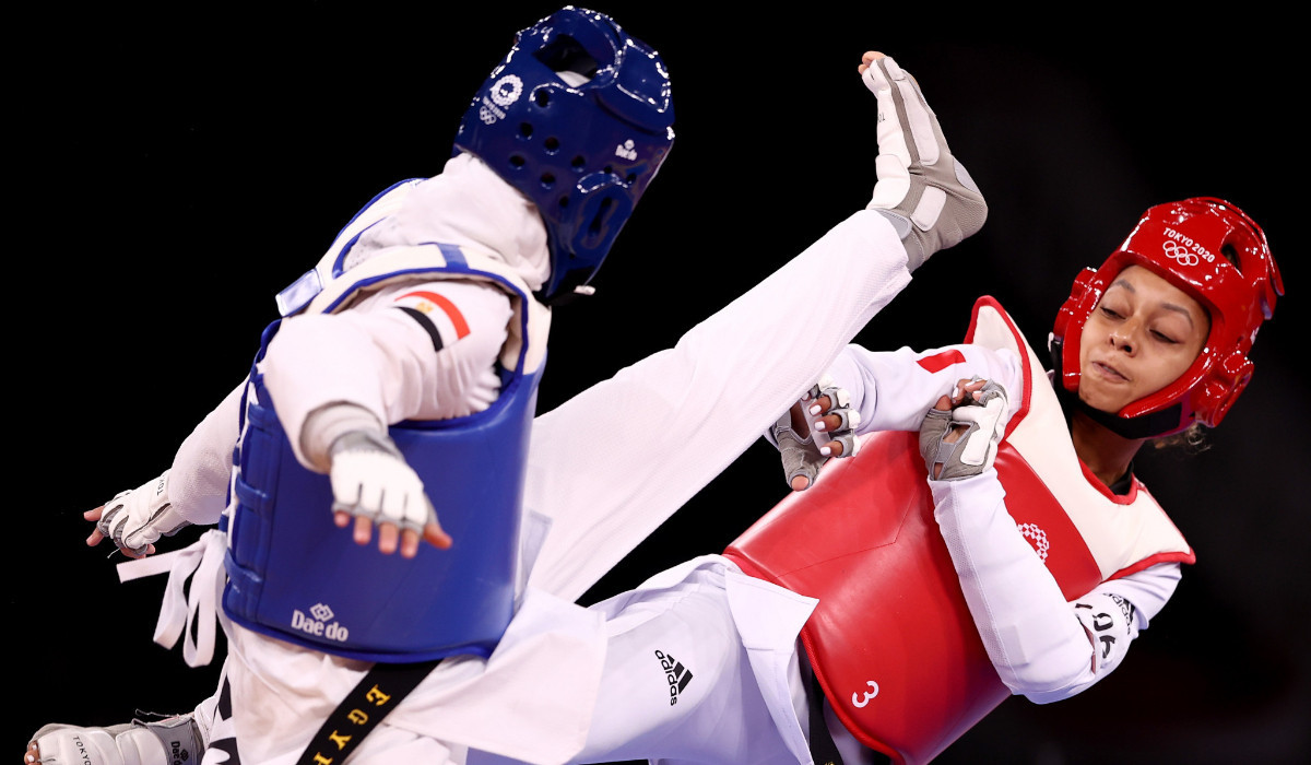 Magda Wiet-Hénin (red) during her fight against Egypt's Hedaya Malak at the Tokyo 2020. GETTY IMAGES