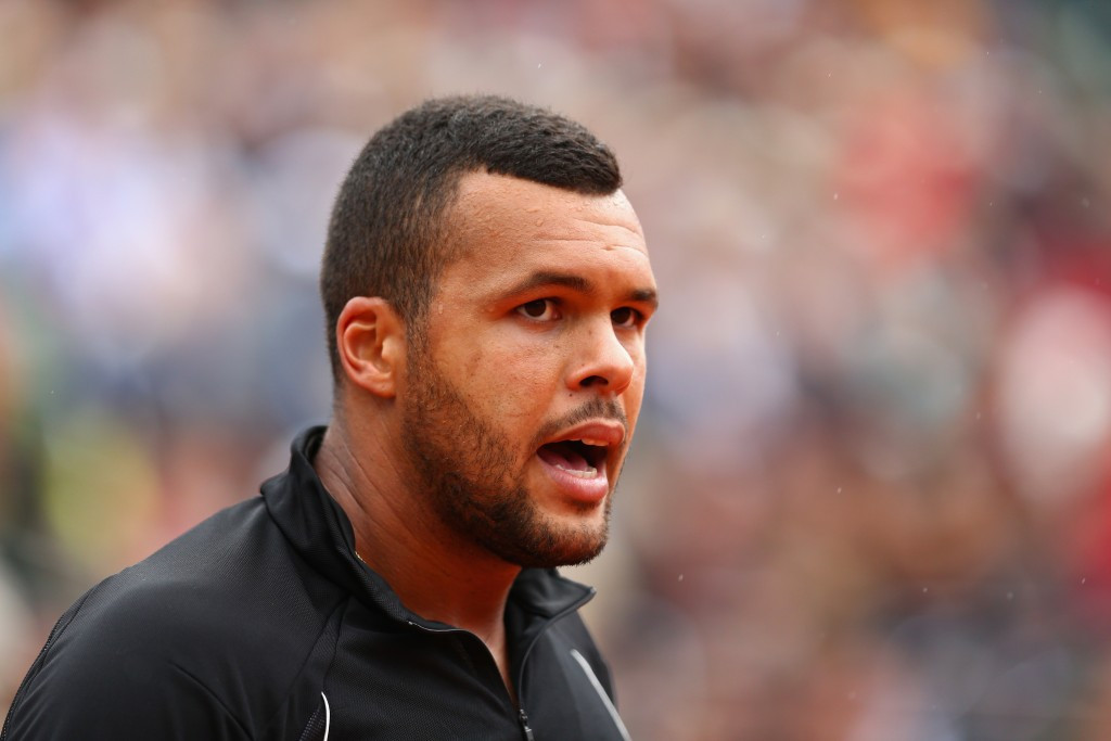 Jo-Wilfried Tsonga ensured home representation in the last eight by beating Tomas Berdych