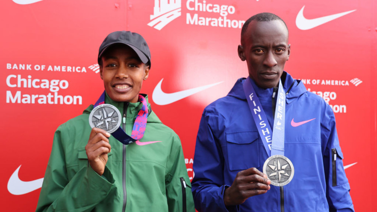 Sifan Hassan and Kelvim Kiptum after winning the 2023 Chicago Marathon. GETTY IMAGES