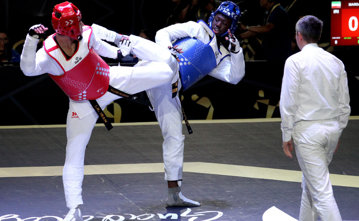 Gambian taekwondo athlete chases Olympic gold after recovering from leg shot. GETTY IMAGES