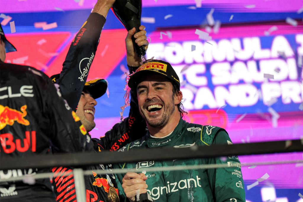 Sergio Pérez and Fernando Alonso celebrating on the podium in Saudi Arabia in 2023. GETTY IMAGES