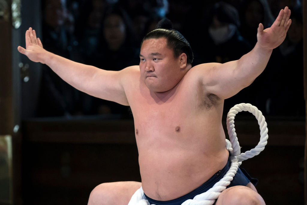 Grand sumo champion Hakuho could lose his stable over protégé's harassment. GETTY IMAGES