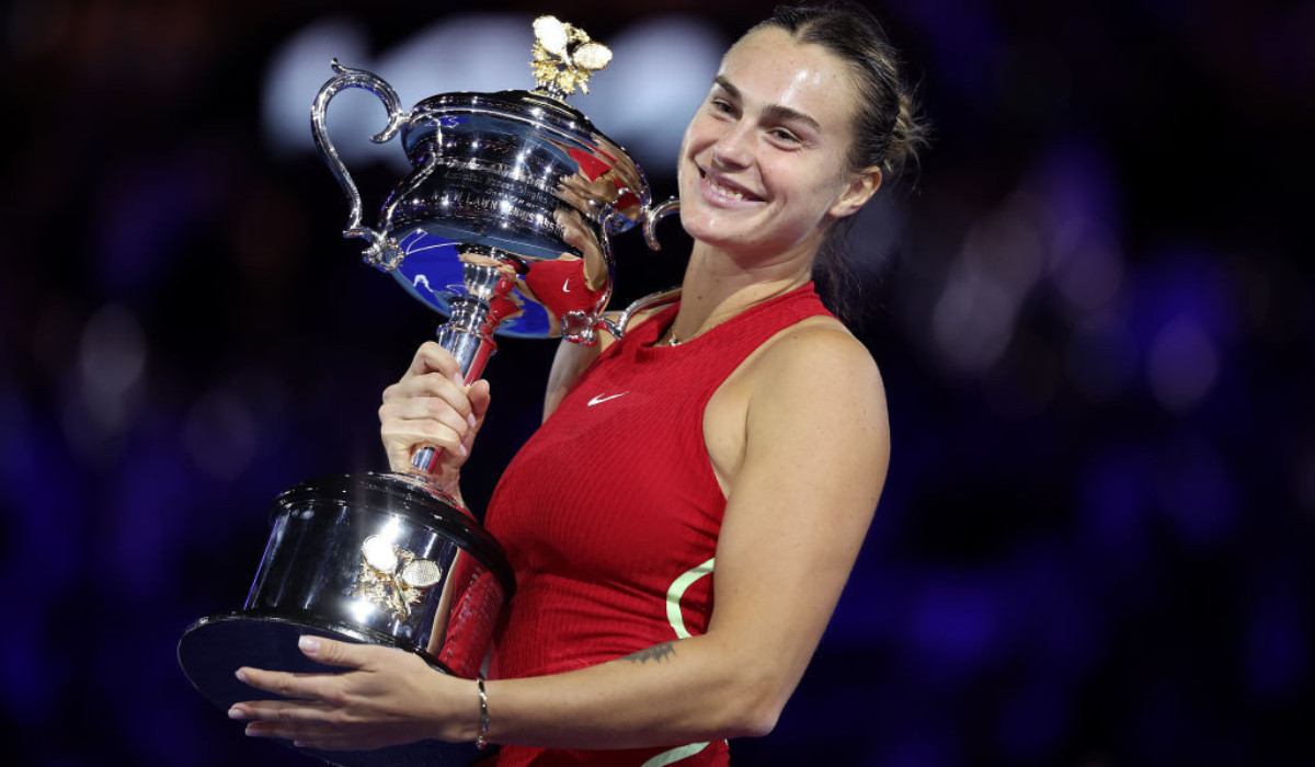 Aryna Sabalenka with the 2024 Australian Open trophy. GETTY IMAGES