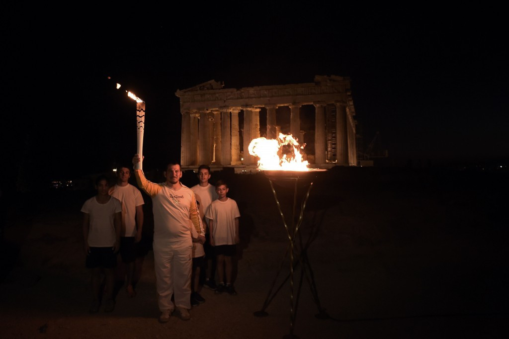 The Olympic flame is spending the evening at the Acropolis Museum after visiting the Eleonas Reception Centre ©Getty Images