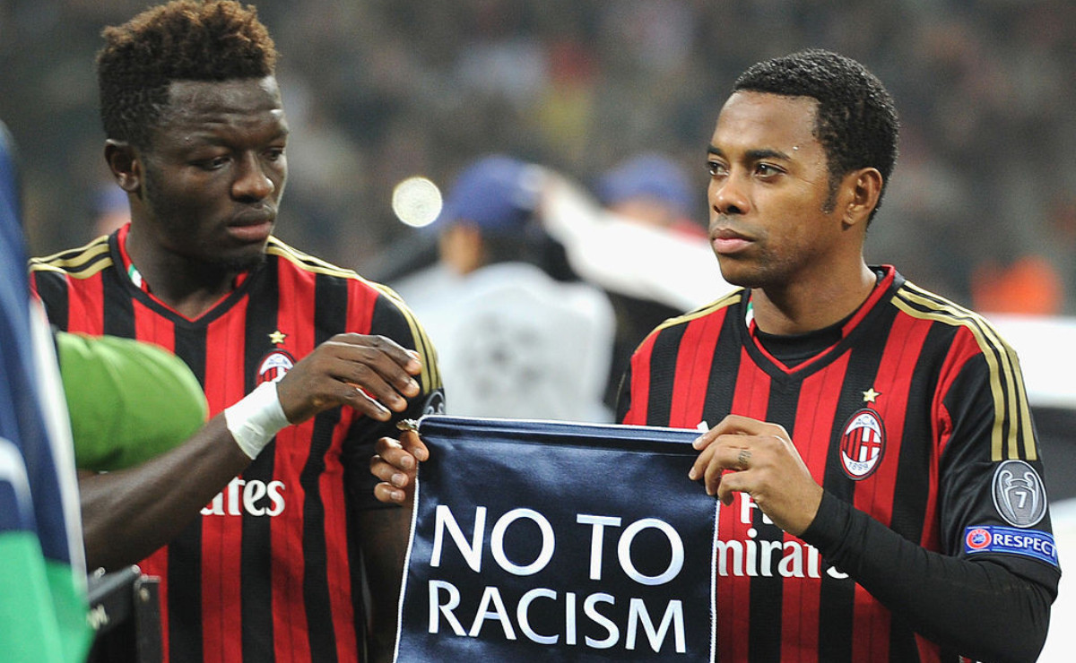 Sulley Muntari and Robinho (R) before a UEFA Champions League 2013 match. GETTY IMAGES