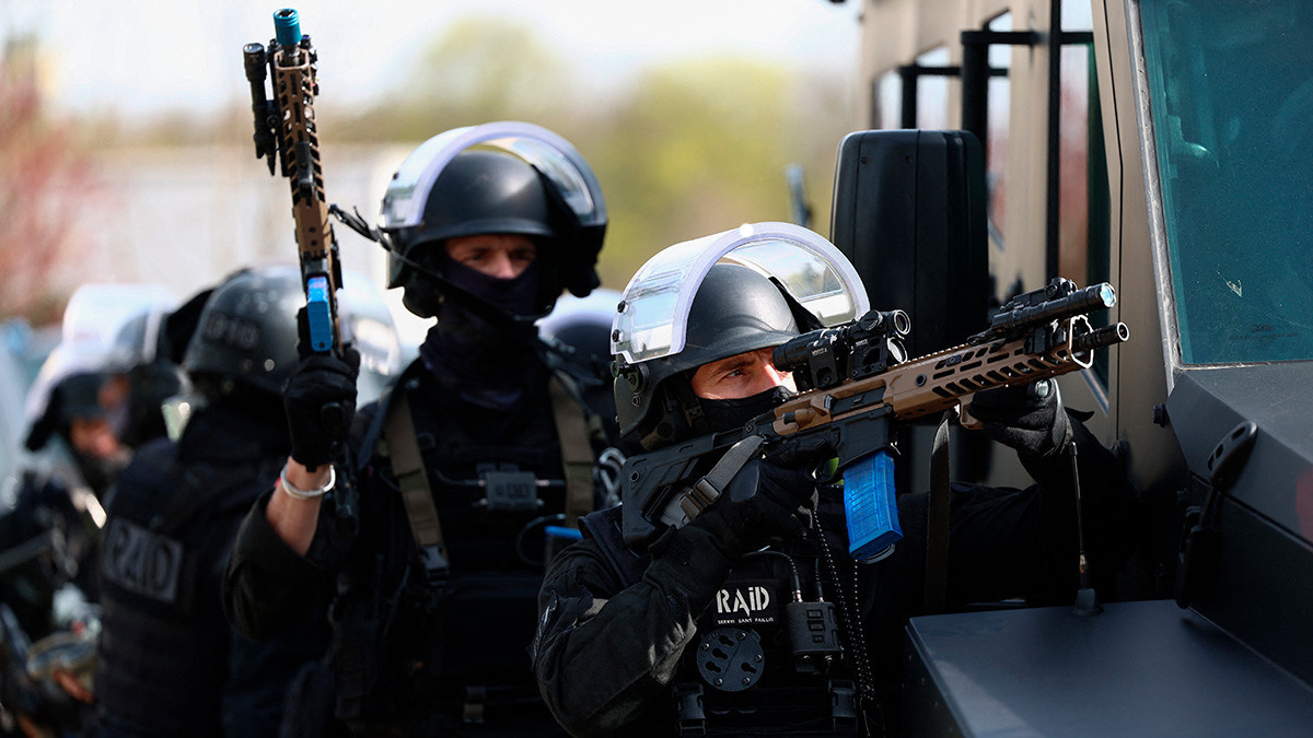 Members of the elite RAID (Research, Assistance, Intervention, Deterrence) unit of the French National Police. GETTY IMAGES. GETTY IMAGES