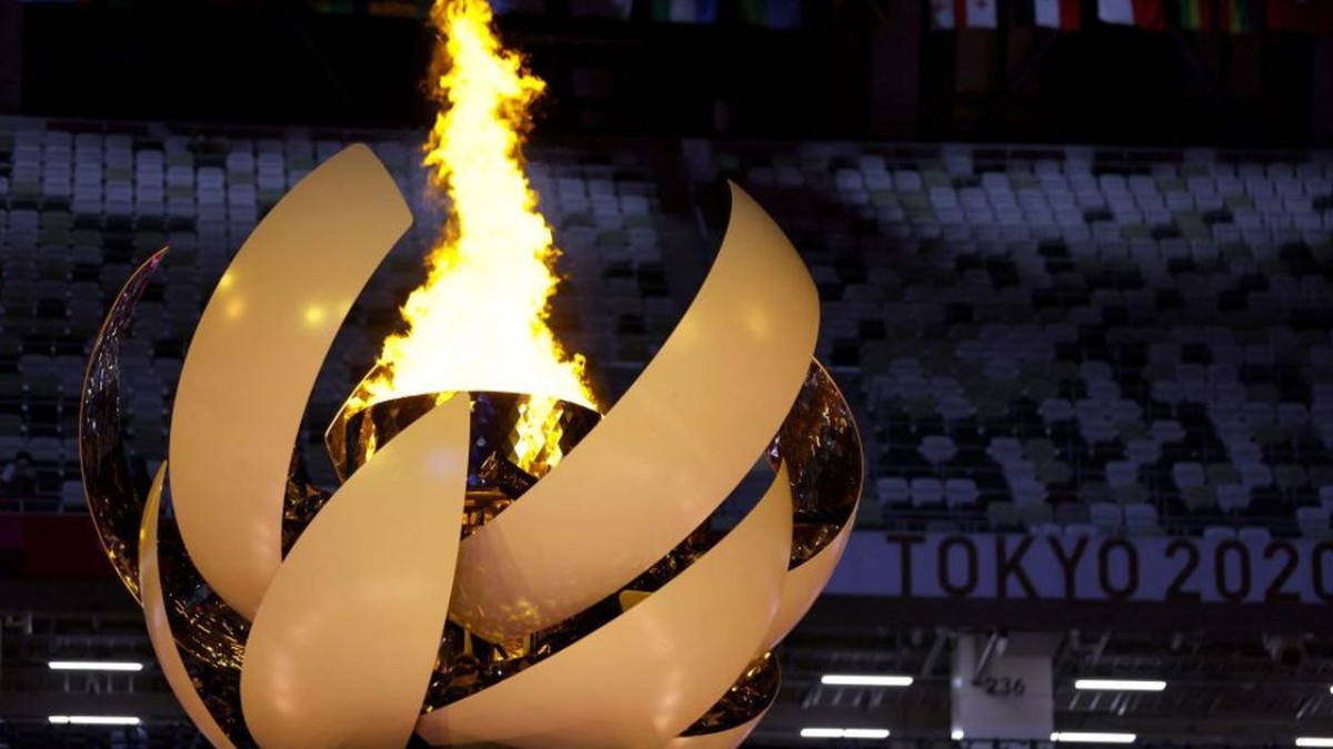 The Olympic cauldron and flame during the Tokyo 2020 opening ceremony. GETTY IMAGES