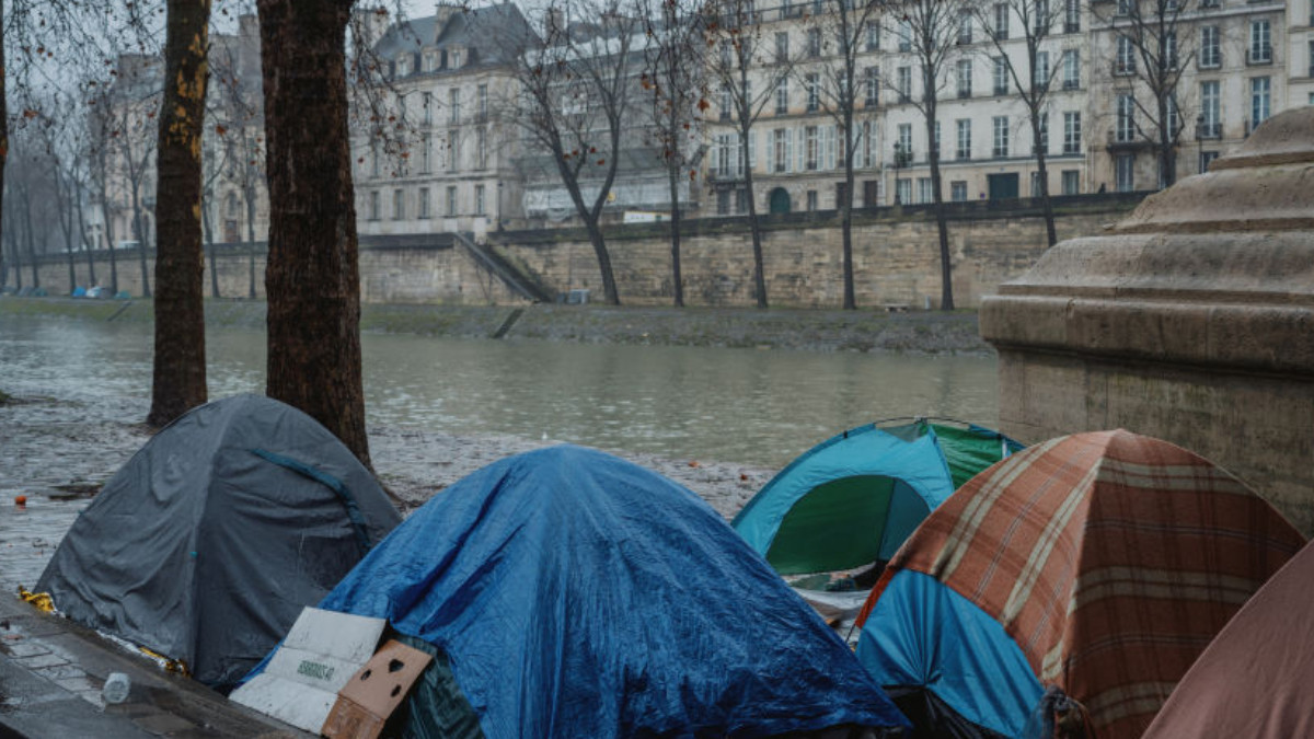 Homeless people living on the banks of the Seine in Central Paris. GETTY IMAGES