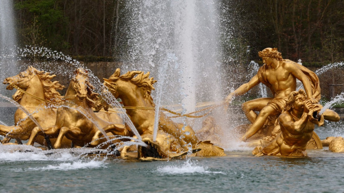 The statue of Apollo in his chariot now shines in gold in Versailles. GETTY IMAGES