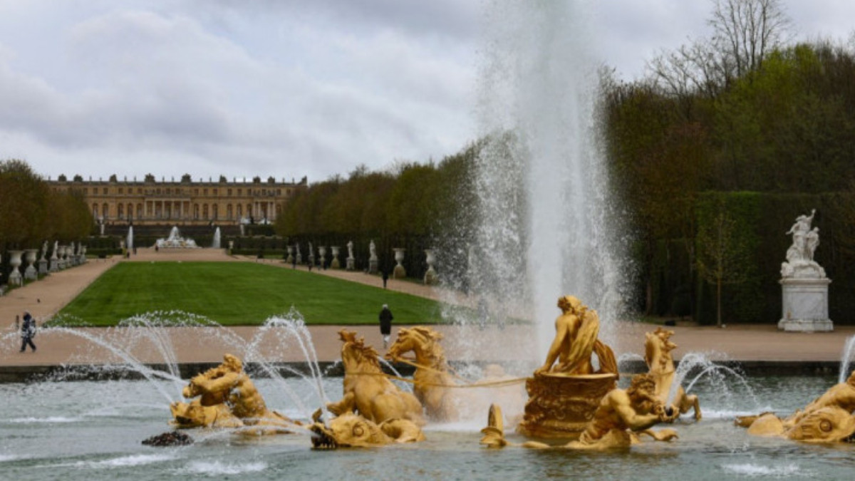 The sun god of Versailles gets a new golden skin for Paris 2024. GETTY IMAGES