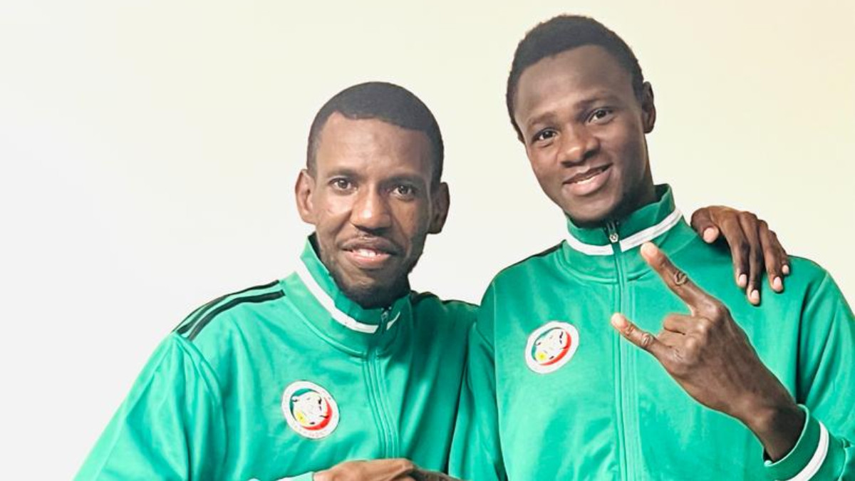 Idrissa Keita (right) with his coach Abdoulaye Ndiaye. WORLD TAEKWONDO