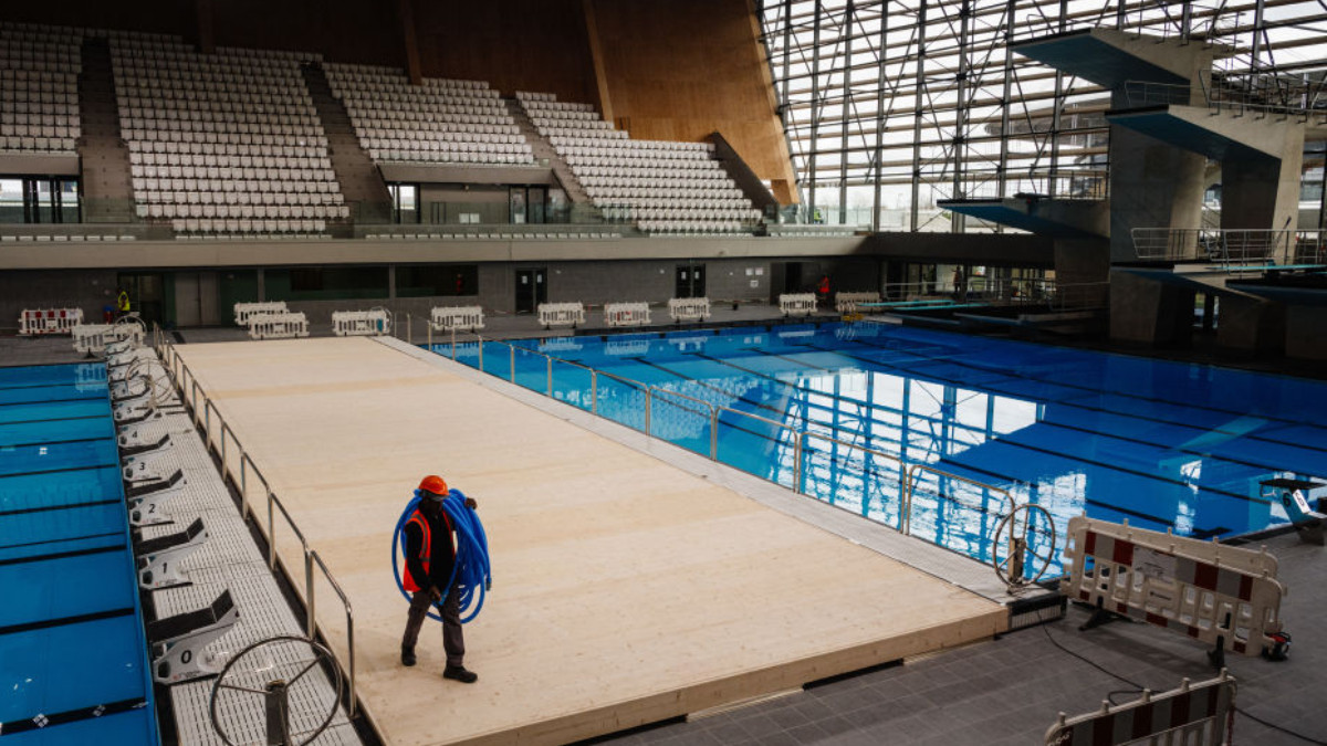A worker at the Aquatics Centre built for the Paris 2024 Olympic Games. GETTY IMAGES
